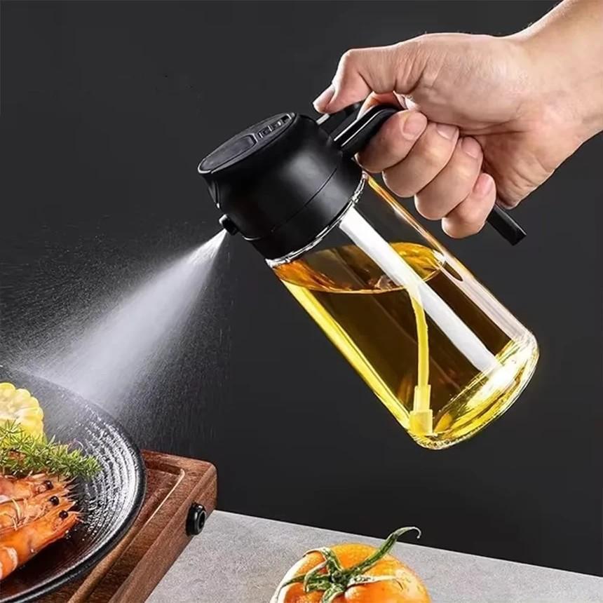 Glass oil dispenser bottle with a flip-top lid and pour spout